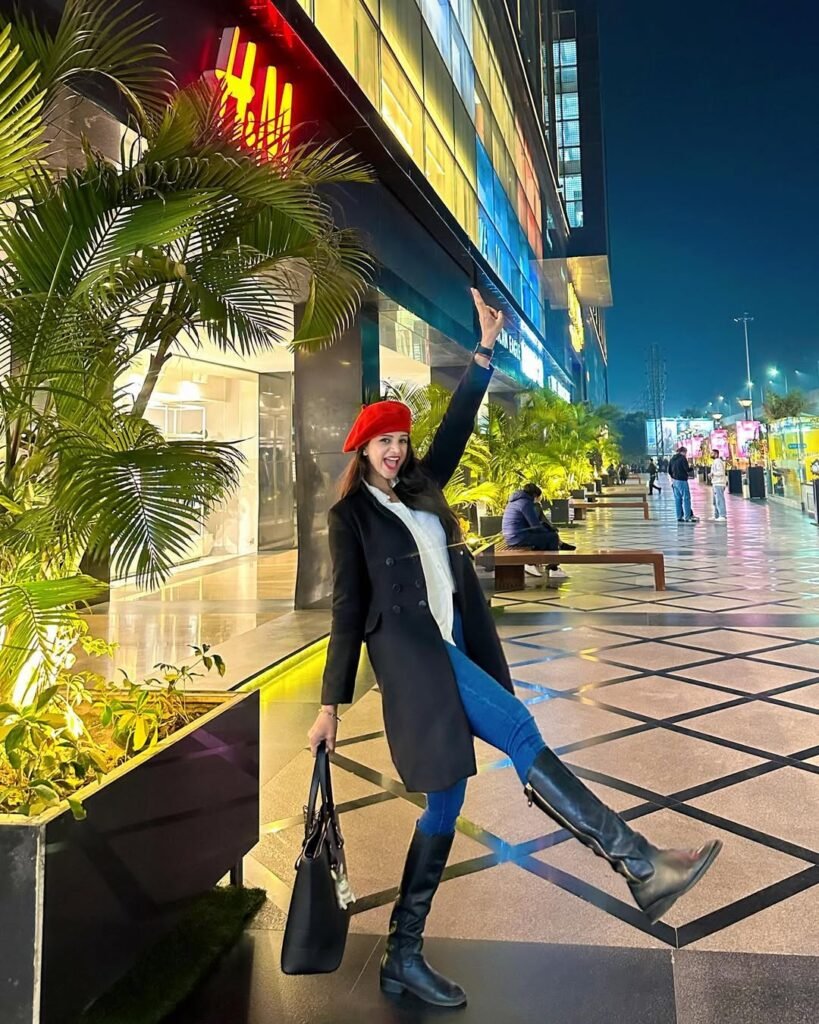 Jeans with Black Knee-High Boots