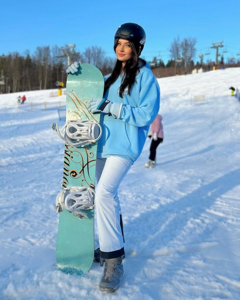Snowboarding Blue Hoodie with White Snow Pants
