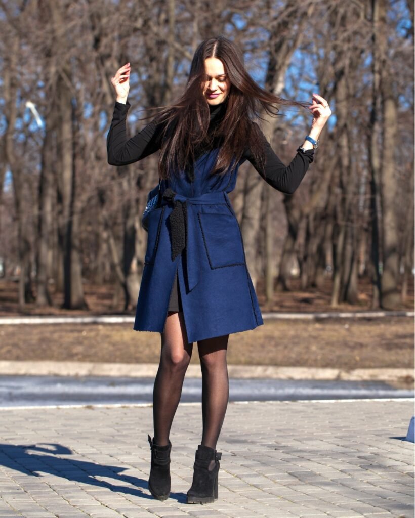 Sleeveless Layered Vest Over a Fitted Base Spring Look